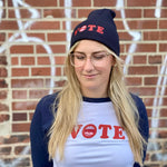Load image into Gallery viewer, blonde woman wearing navy vote beanie and navy and white vote raglan