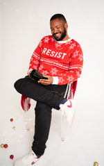 Load image into Gallery viewer, Person wearing resist ugly holiday sweater