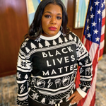 Load image into Gallery viewer, Cori Bush in Black Lives Matter Ugly Holiday Sweater
