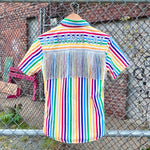 Load image into Gallery viewer, Rainbow thrifted button up with silver fringe and &#39;So Damn Gay&quot; in silver glitter across the shoulders 
