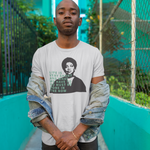 Load image into Gallery viewer, Photo of person wearing Audre Lorde Quote unisex tee
