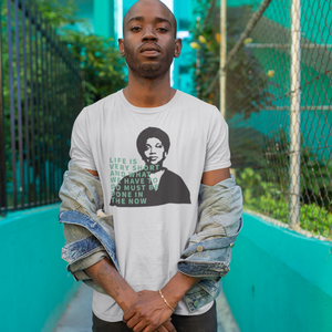 Photo of person wearing Audre Lorde Quote unisex tee