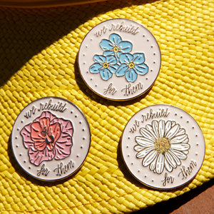 COVID-19 Memorial Pin Set (3) on a yellow hat