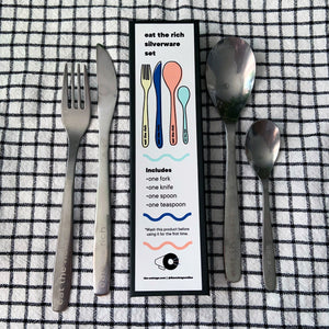 Eat The Rich Silverware Set with packaging