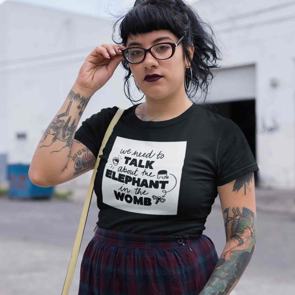 Person wearing Elephant in the Womb tee