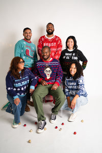 Group wearing 2021 ugly holiday sweaters
