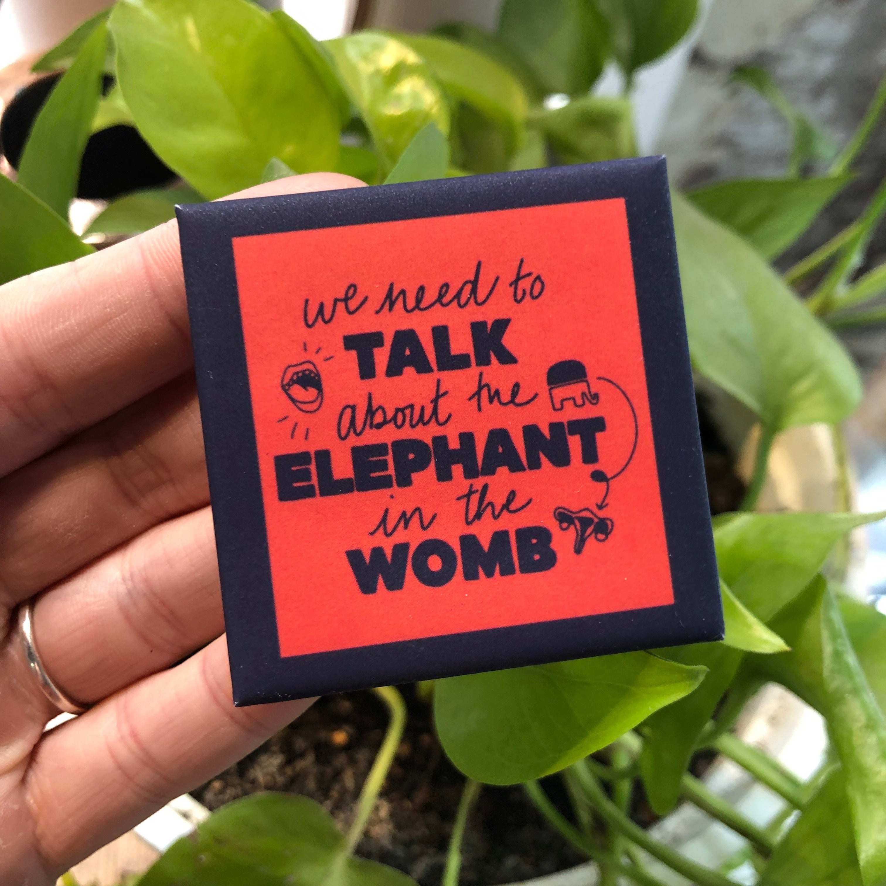 Elephant In The Womb Button