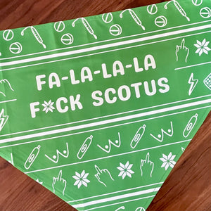 Flat lay close up of Green bandana with reproductive Health doodles and "Fa-La-La-La F*ck SCOTUS" Design