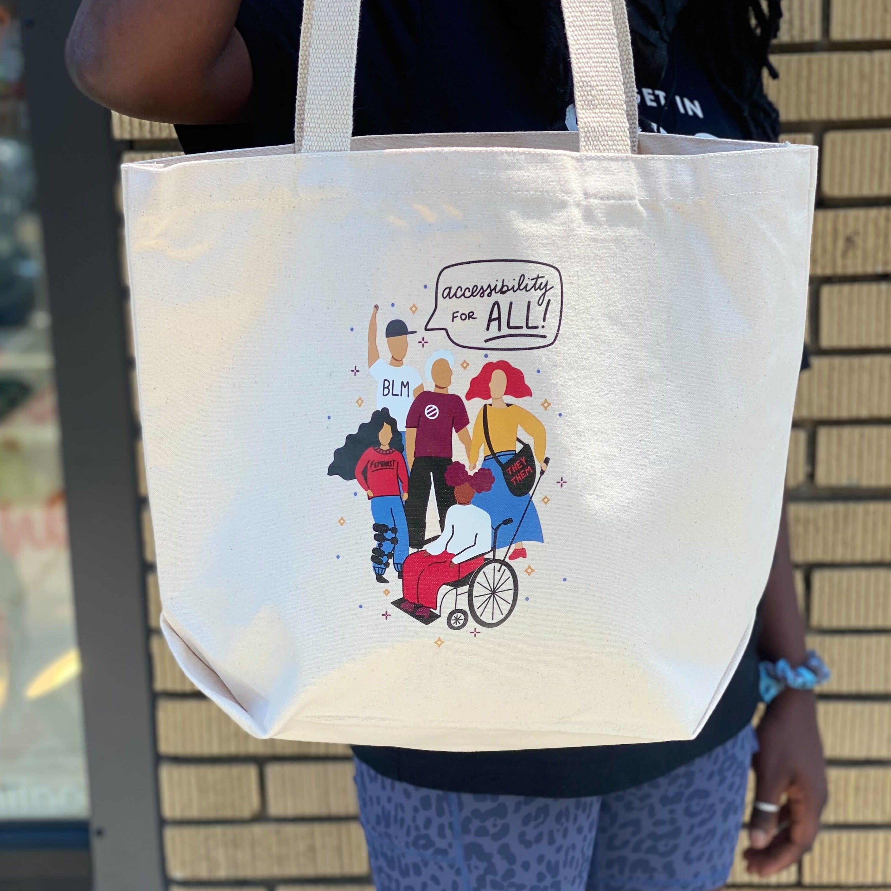 Person carrying Accessibility For All Tote.