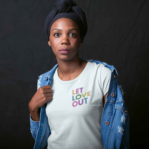 Person wearing Let Love Out Unisex Tee