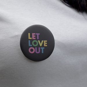 Person wearing Let Love Out button