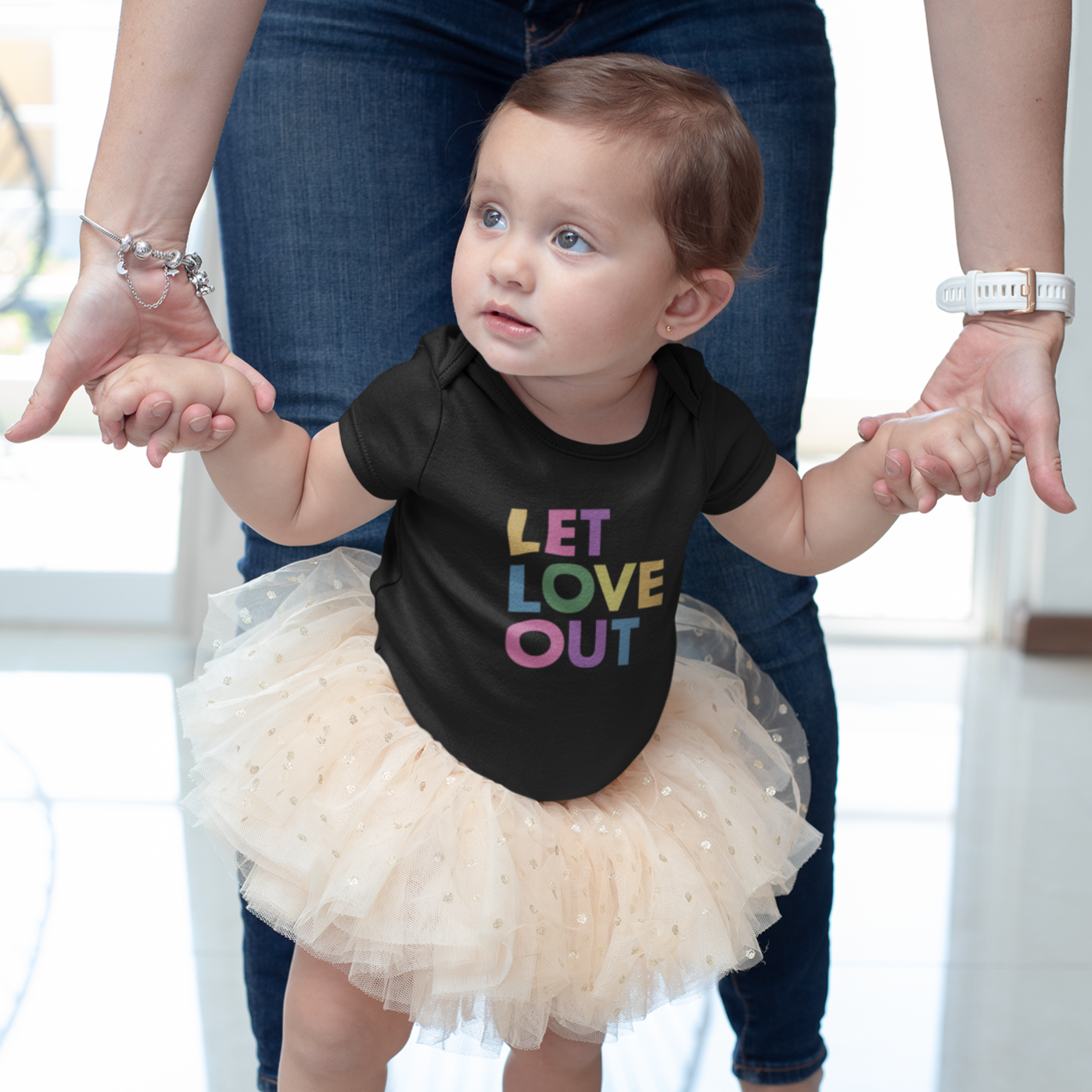 Toddler wearing Let Love Out tee