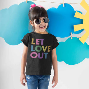 Child wearing Let Love Out unisex tee