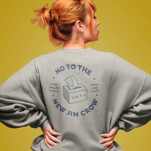 Person wearing No To The New Jim Crow sweatshirt back