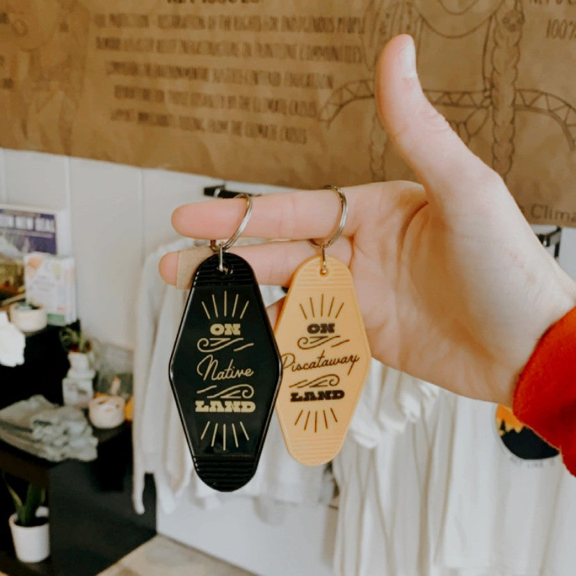 Yellow and black Native Land keychains