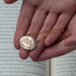 Load image into Gallery viewer, Bronze oval necklace with &quot;Choose People Who Lift You UP&quot; Michelle Obama
