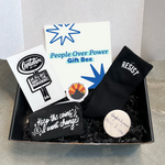 Load image into Gallery viewer, Gift box including: black socks with &quot;Resist&quot; design, Policy and change button, Our Home is on Fire button, coin purse with &quot;Keep the Coins, I want Change!&quot; design, and We all quit Capitalism sticker.
