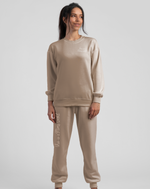 Load image into Gallery viewer, Person standing wearing Ma&#39;am Shoes &quot;This Is A Mom&#39;s World&quot; sweatpants and sweatshirt.
