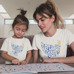Load image into Gallery viewer, No One Is Safe Unless Everyone Is Safe Onesie + Kid&#39;s Tee (inspired by Fannie Lou Hamer)
